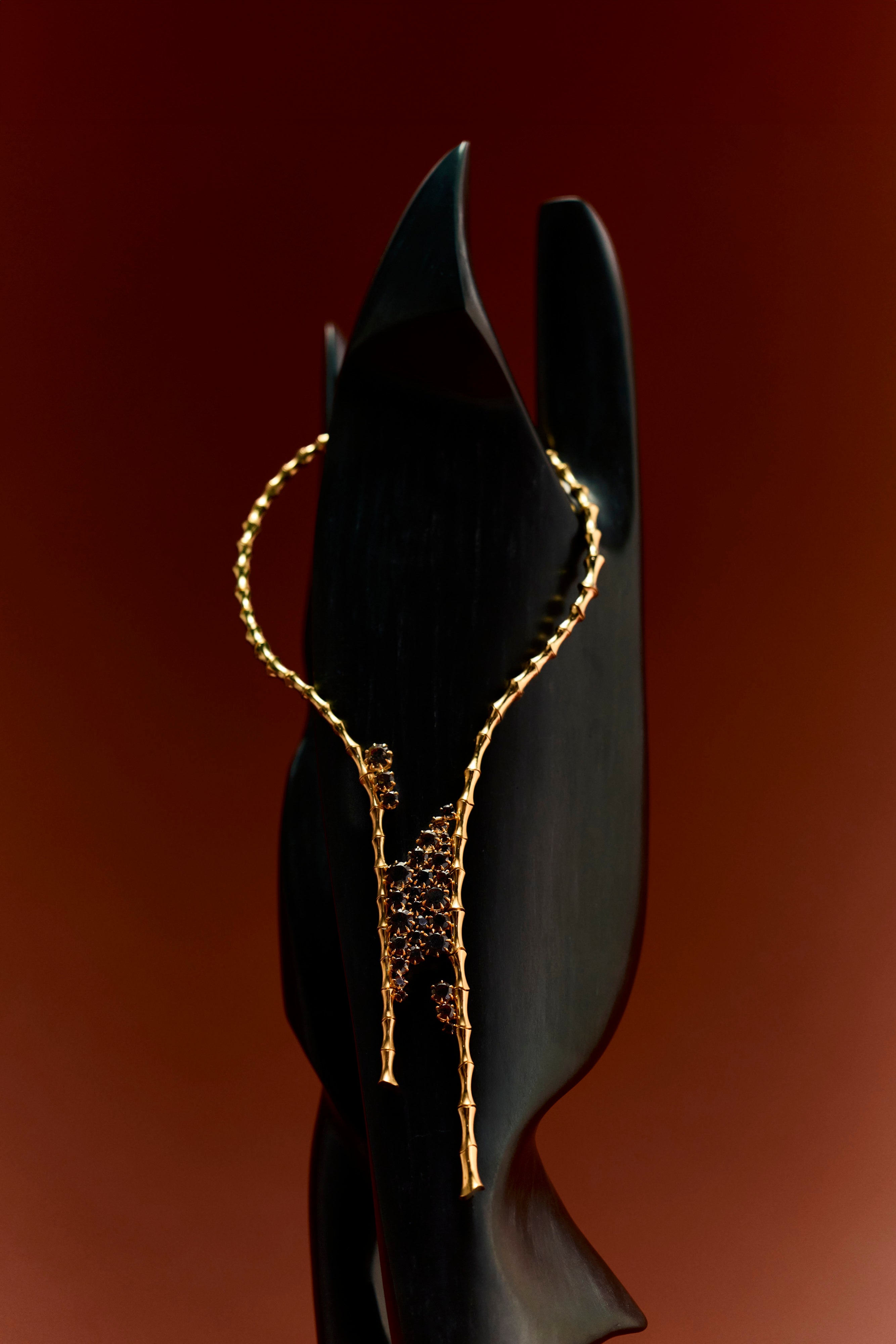 Le Morne Necklace sculpted in bronze with cascading Cognac Topazes, finished in 24k gold plating