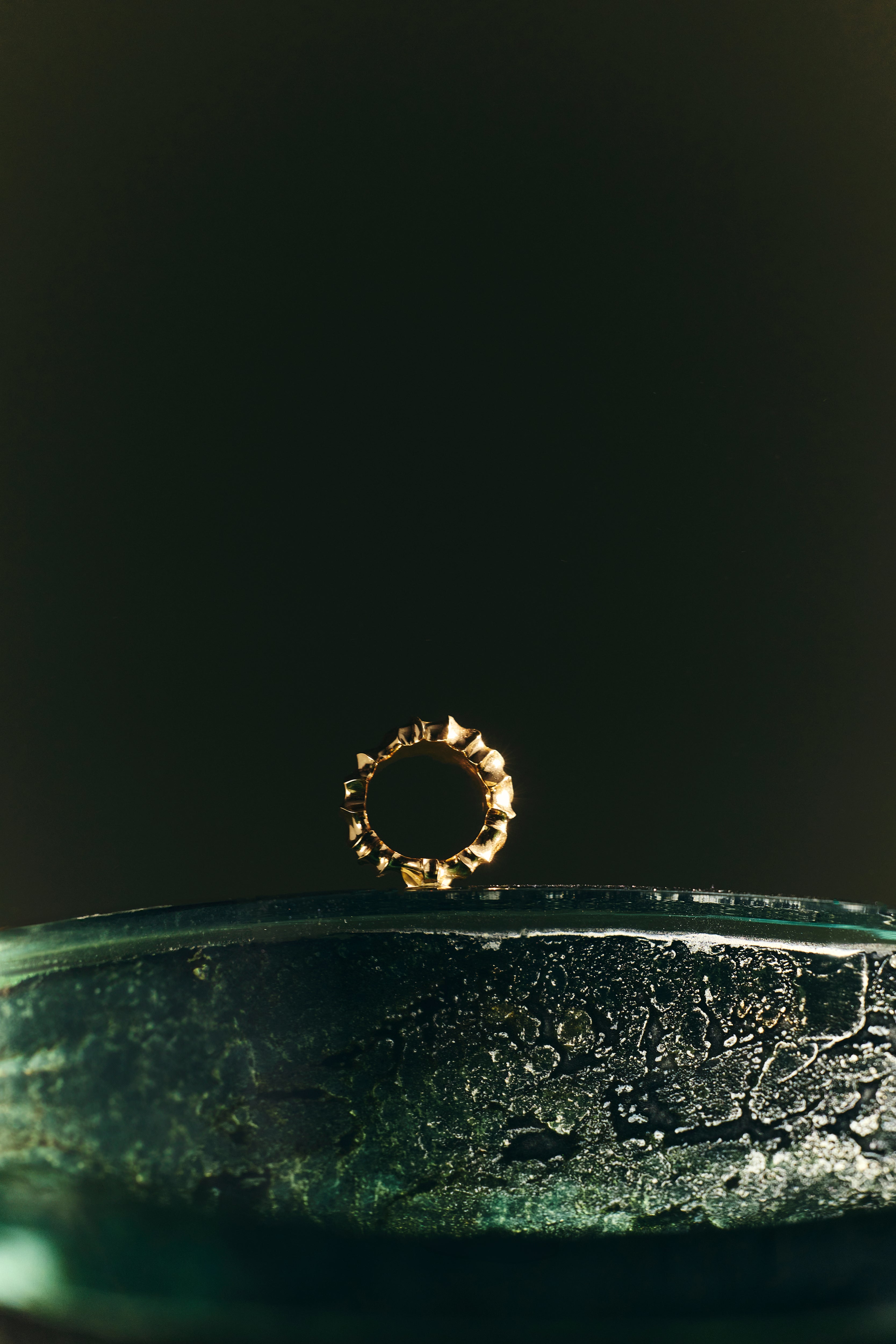 Haline Ring sculpted in bronze with slim continuous form, finished in 24k gold plating