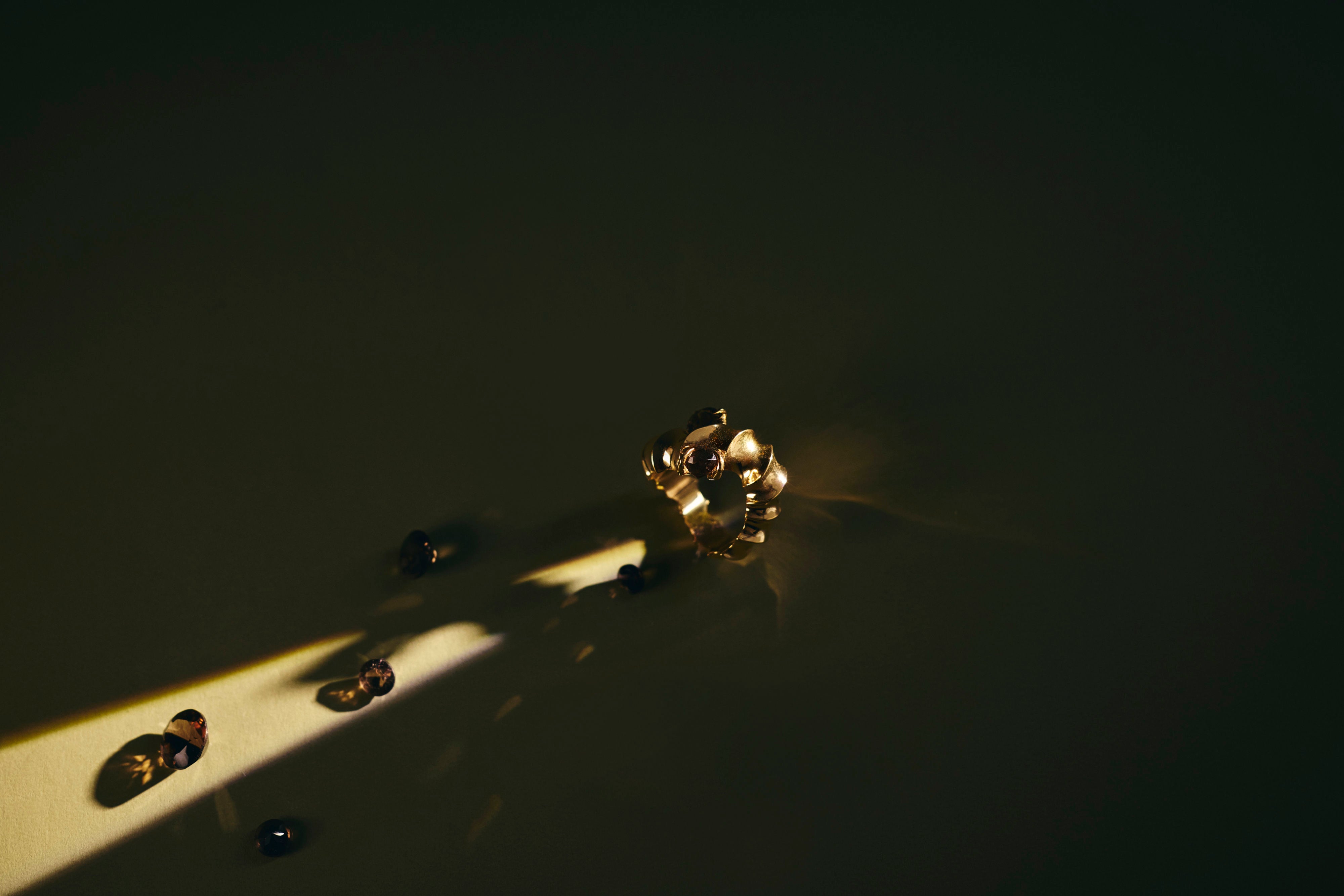 Shoal Ring sculpted in bronze with Cognac Topazes in clustered setting, finished in 24k gold plating