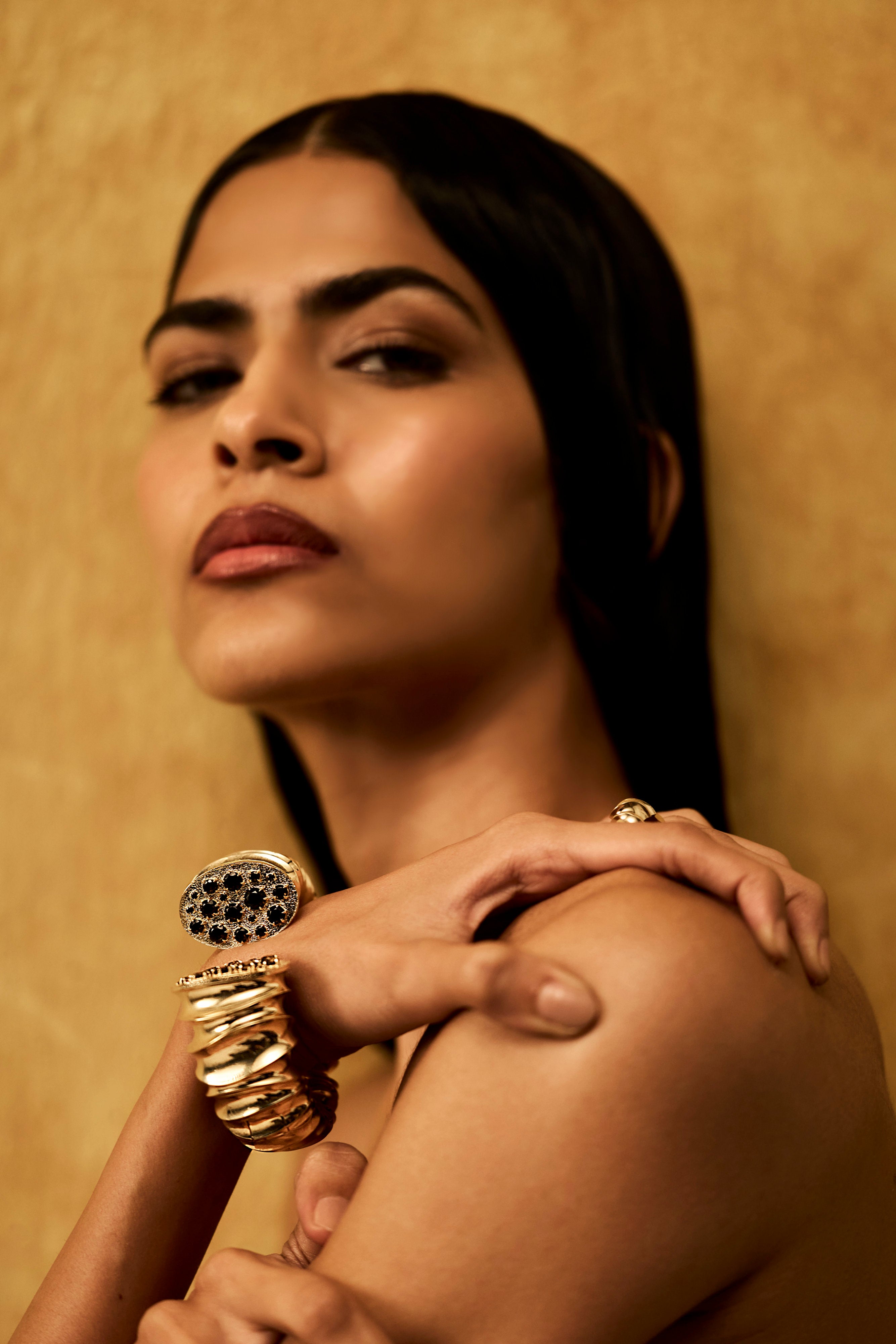 Gulf Cuff sculpted in bronze with hand-hammered texture and Cognac Topazes, finished in 24k gold plating